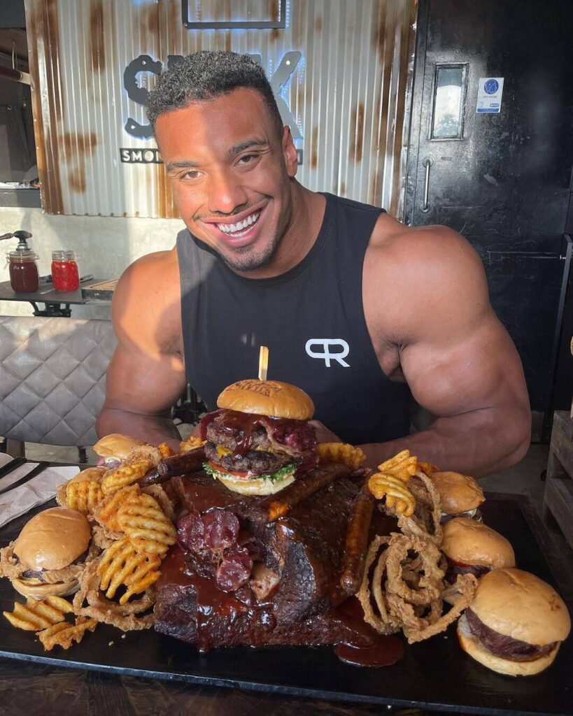 larry wheels eating burger