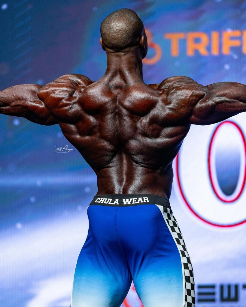 erin banks mr olympia back posing