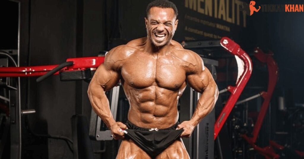 Alex Cambronero mid-pose in a gym