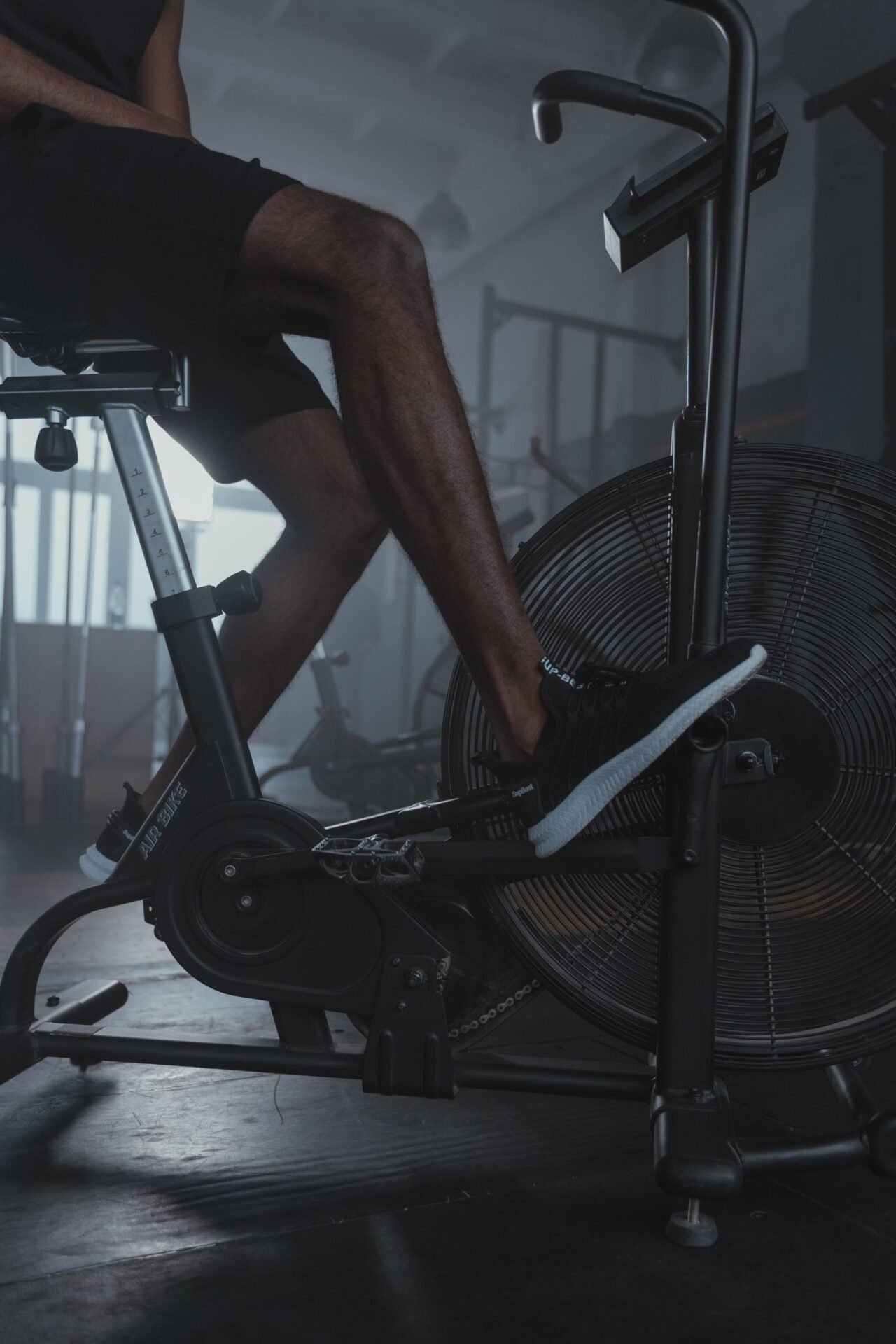 Close-up of a fan bike being pedalled hard during an interval session