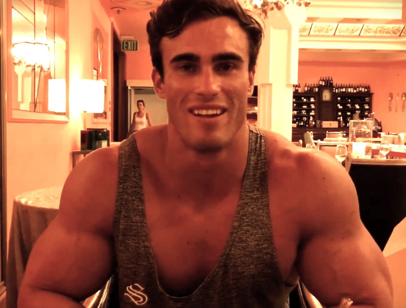 Calum Von Moger smiling at the camera in a stringer vest, 2017