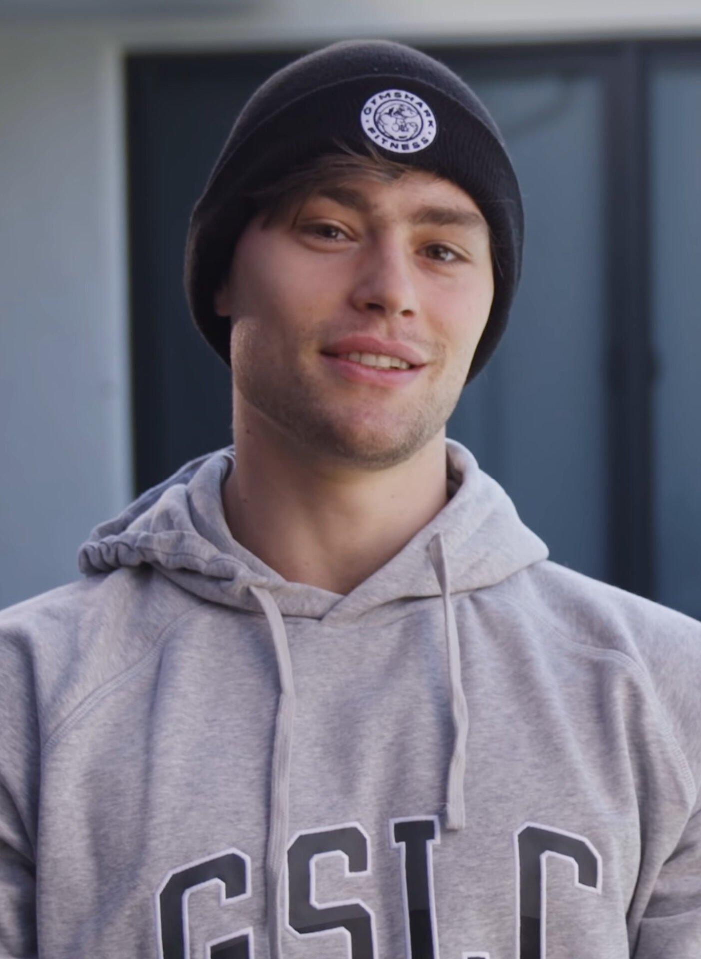 Portrait of David Laid in 2021 wearing a Gymshark beanie and hoodie