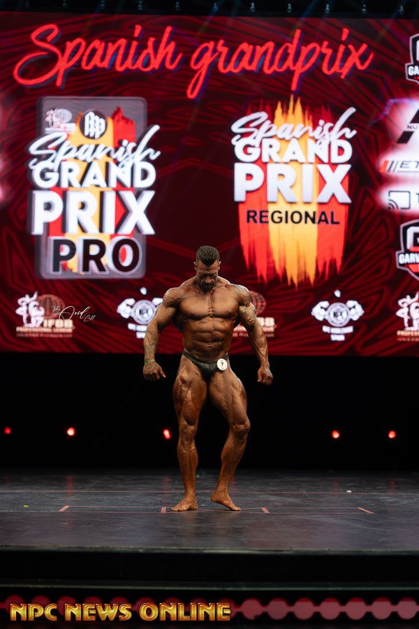 Jesus Rodriguez Sendra in a front pose on stage at the 2025 Spanish Grand Prix Pro