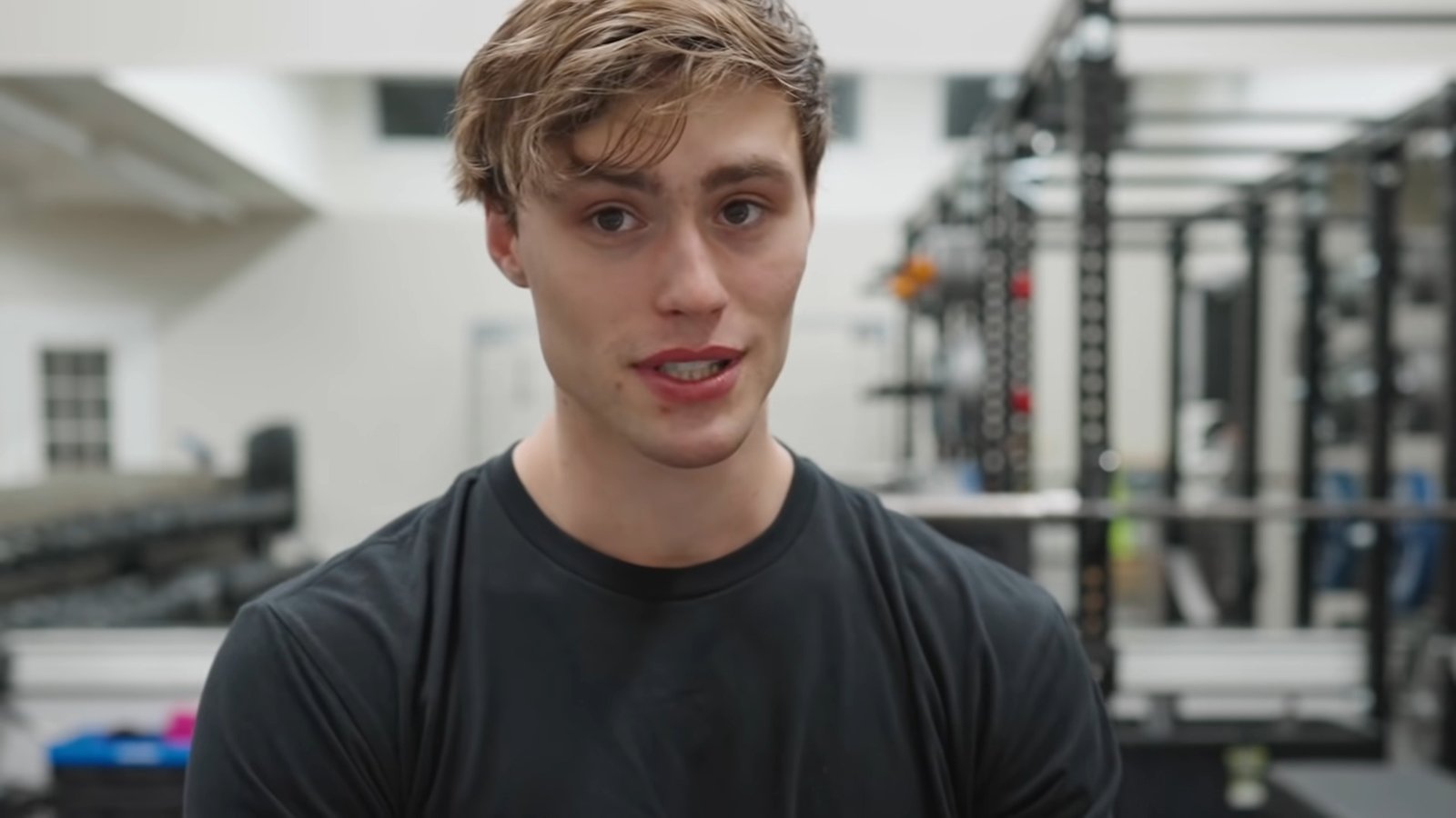 David Laid talking to camera during a Gymshark gym video in 2022