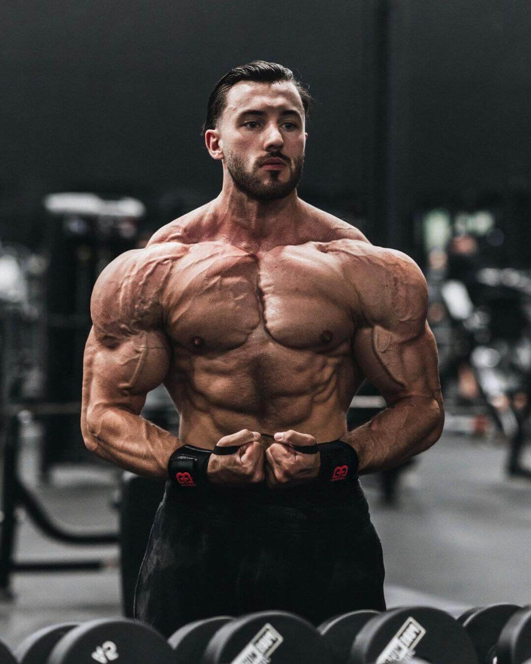 Brandon Harding posing in the gym during a workout