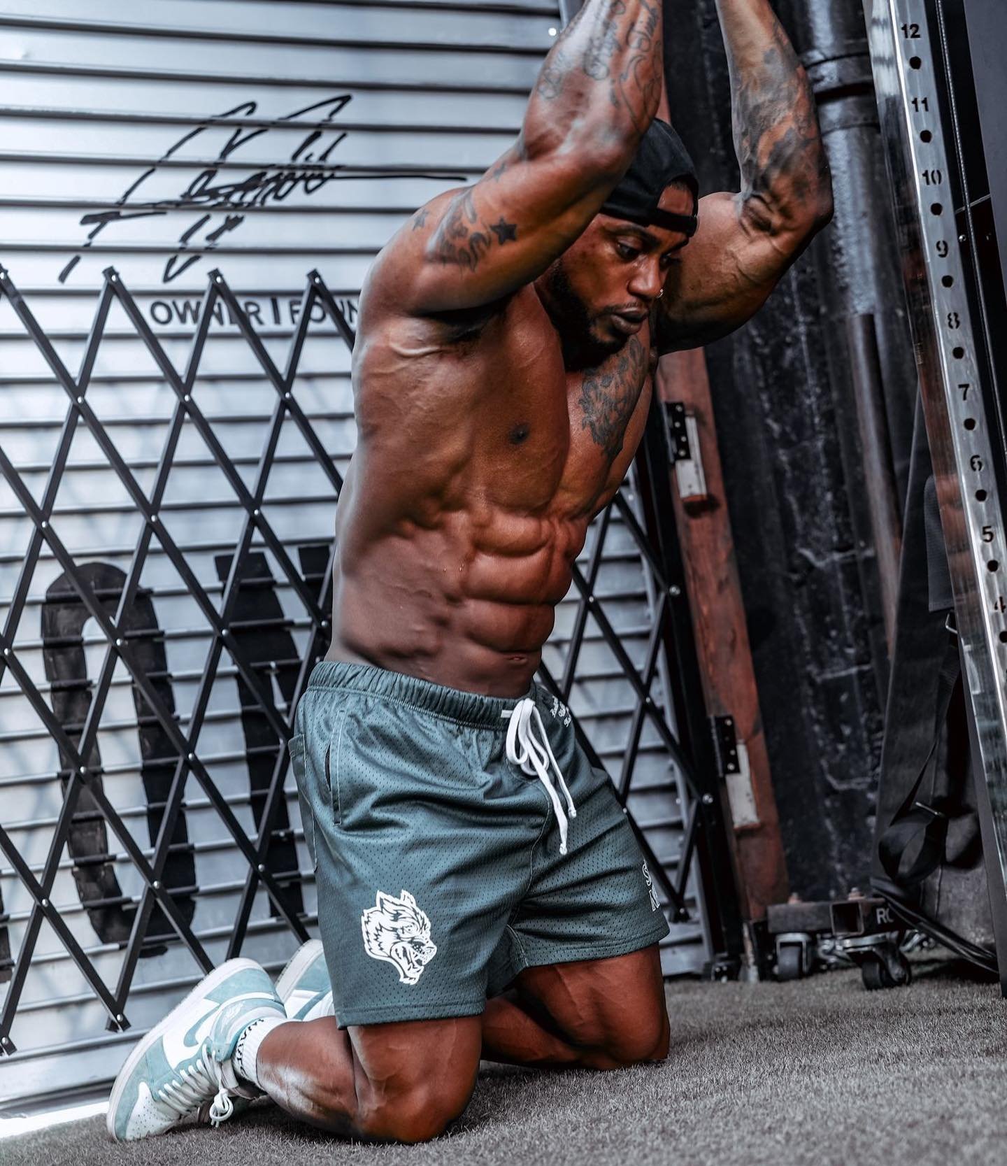 Brandon Hendrickson stretching in the gym