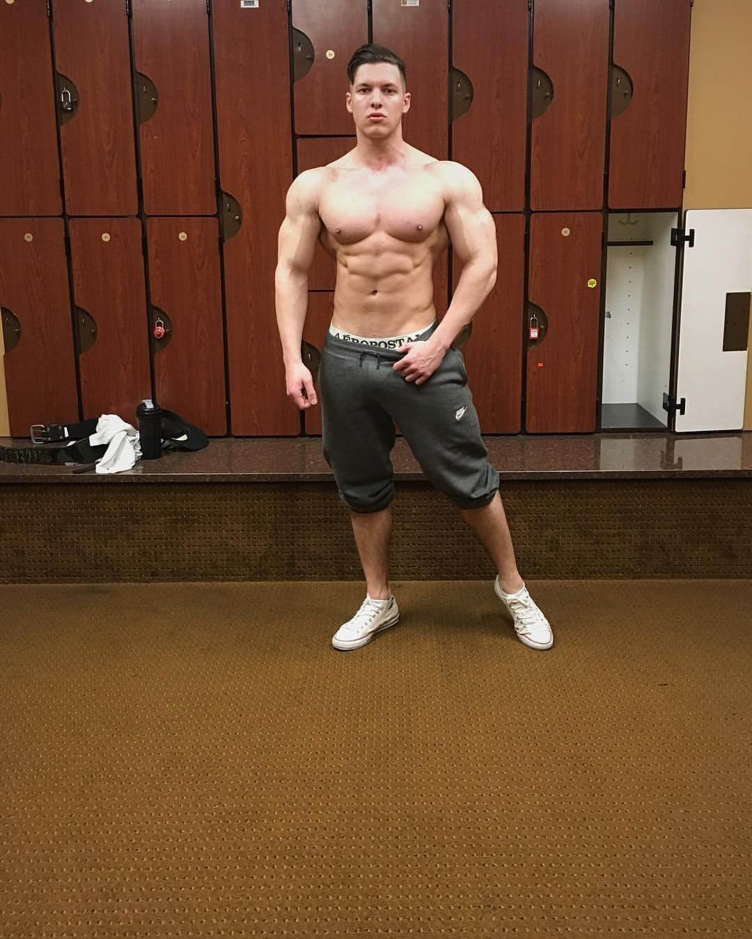 A young Carlos Deoliveira in a gym locker room