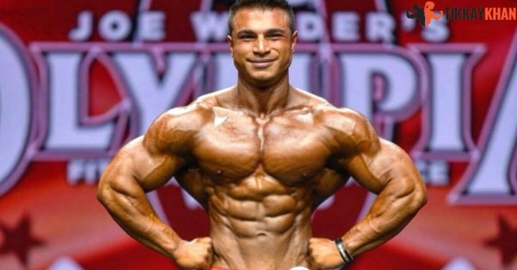 Furkan Er on stage at an Olympia-branded event