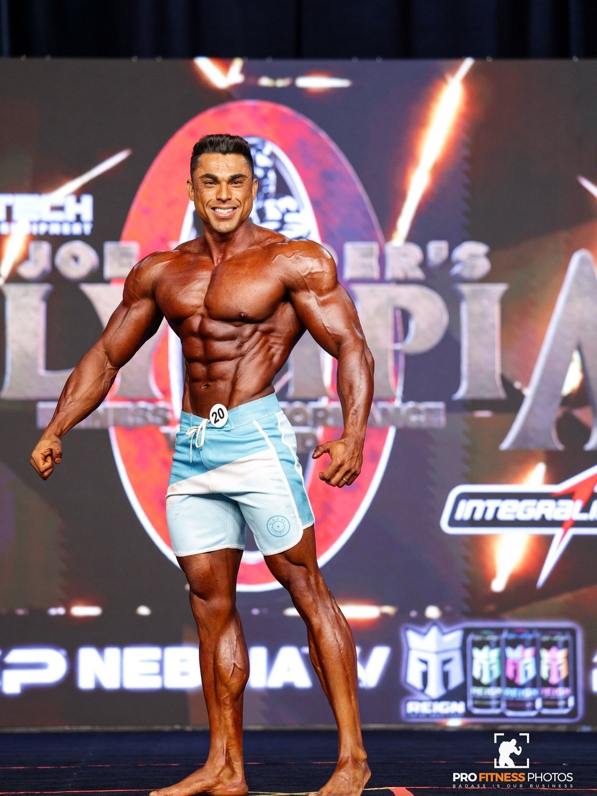 Guilherme Gualberto posing on the Mr. Olympia stage in Las Vegas