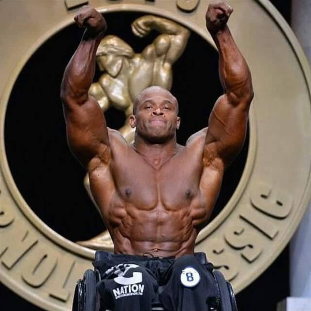 Harold Kelley hitting a victory pose at the Arnold Classic