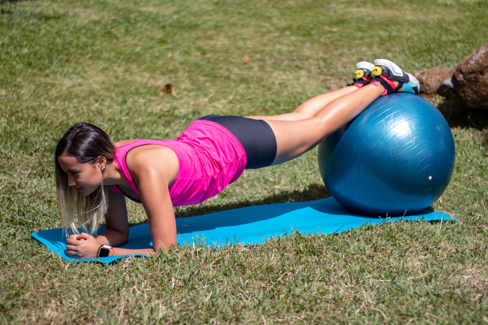 A person doing a plank on a stability ball
