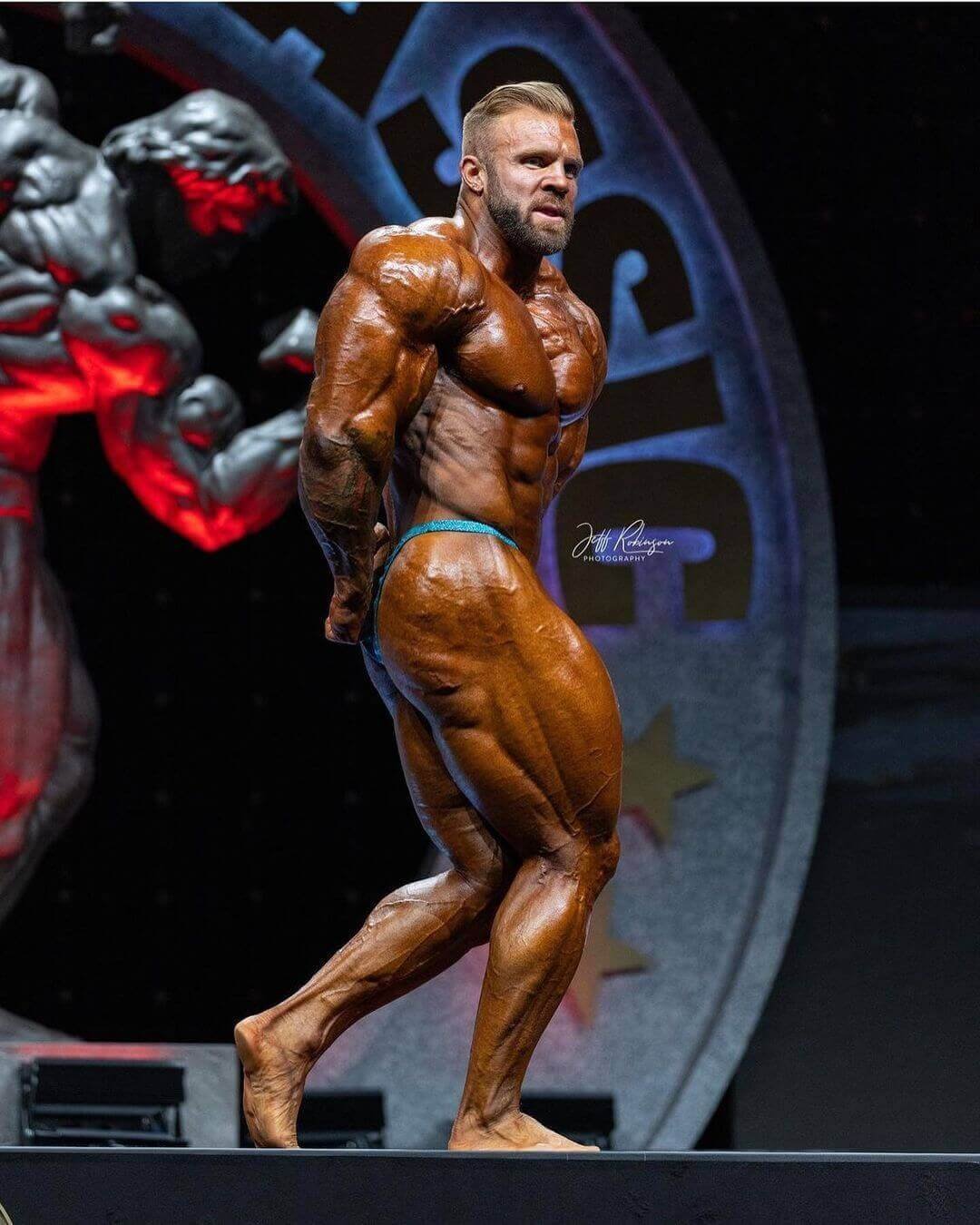 Iain Valliere posing from the side during a prejudging round