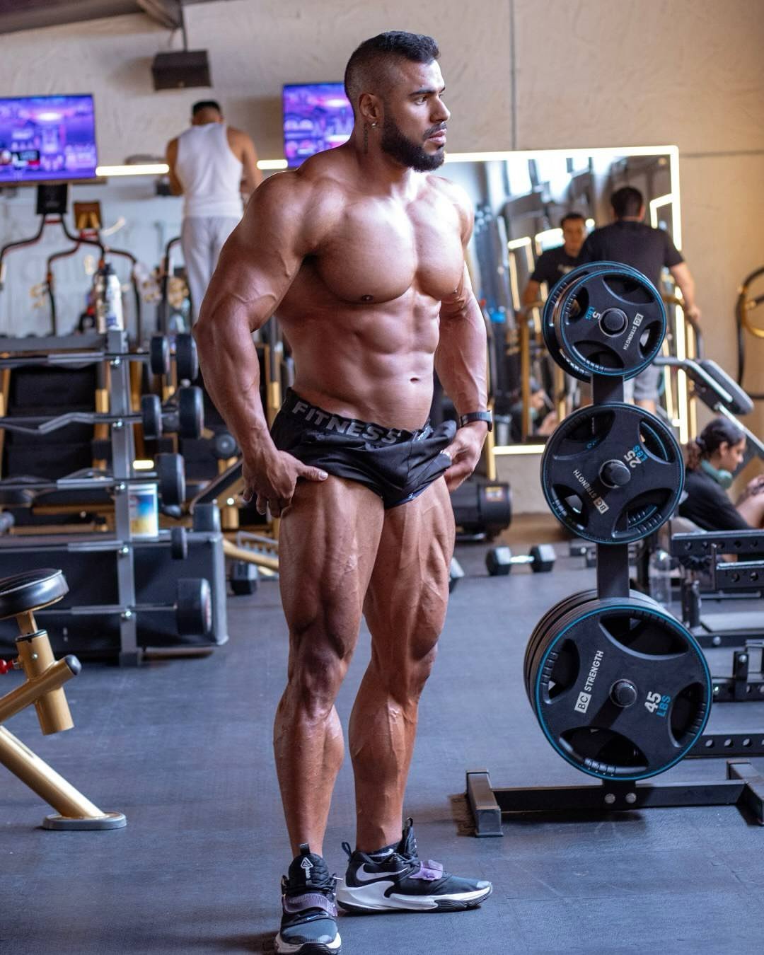Juan Gochez standing in a gym between training sessions