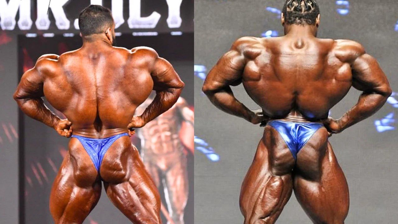 Hadi Choopan and Kai Greene in the rear lat spread, side by side from separate contests