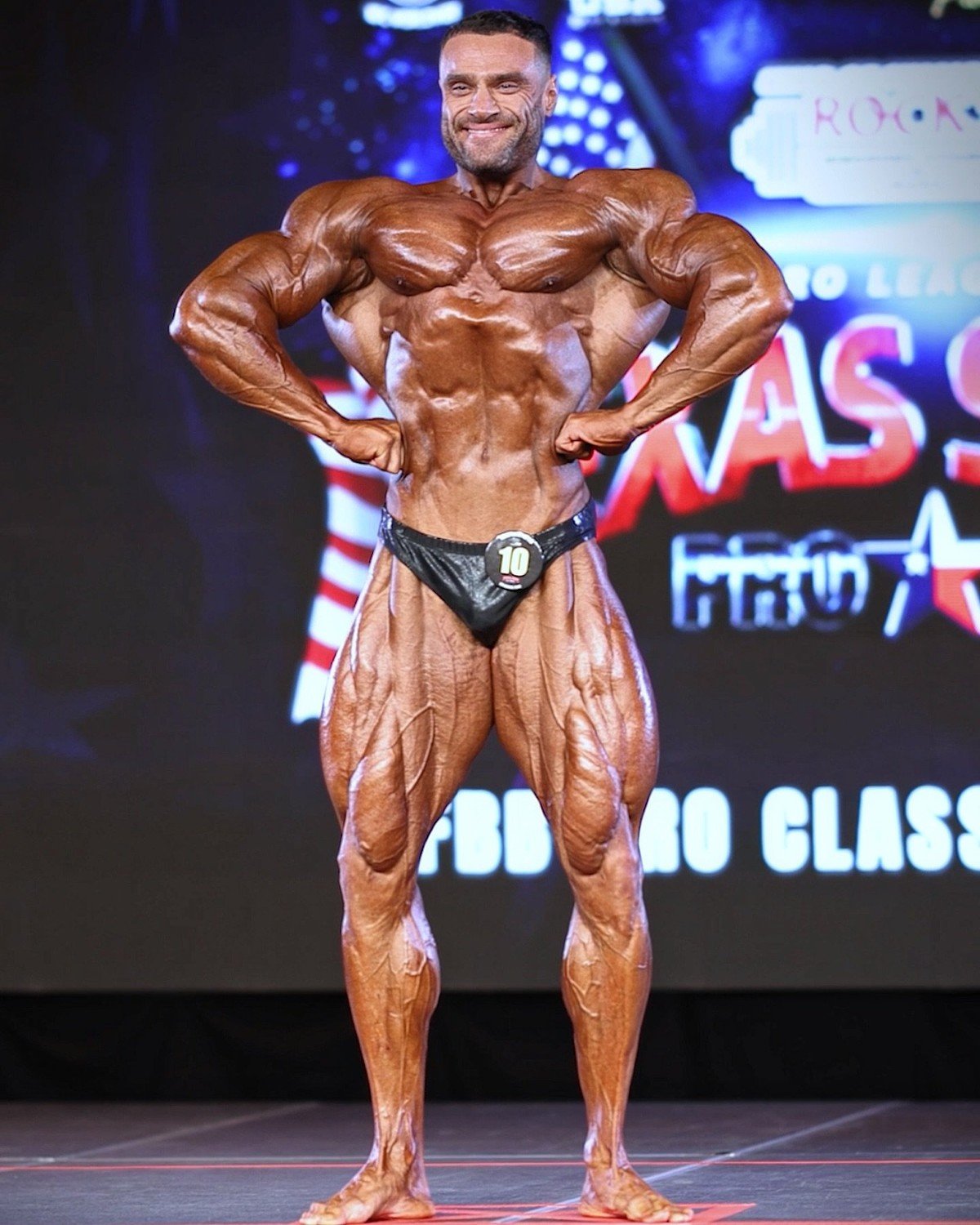 Kyrylo Khudaiev hitting a front lat spread on the Texas State Pro stage
