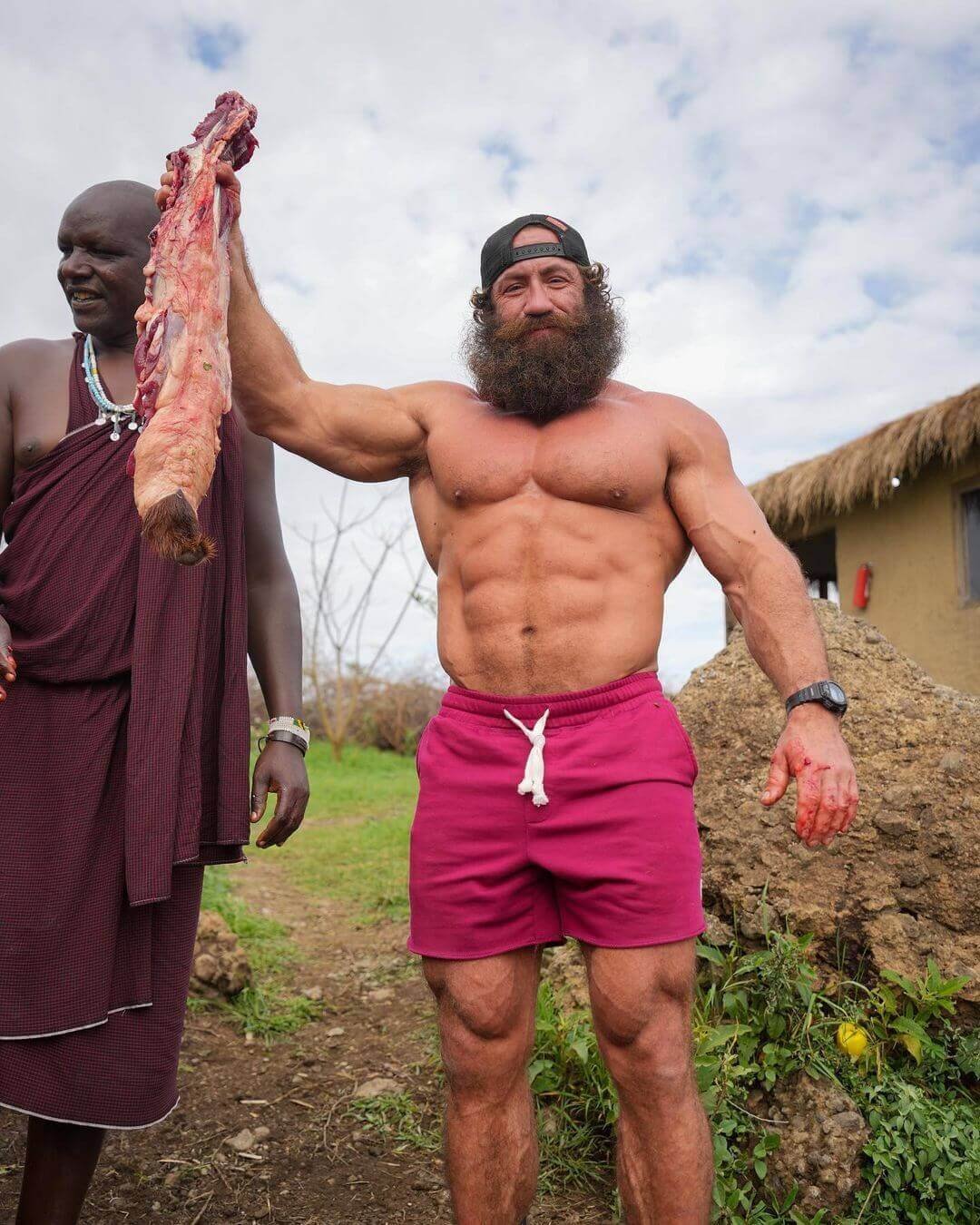 Liver King holding raw organ meat