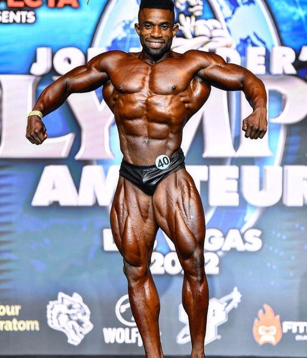 Miguel Malimo on stage at the 2022 NPC Worldwide Amateur Olympia in Las Vegas