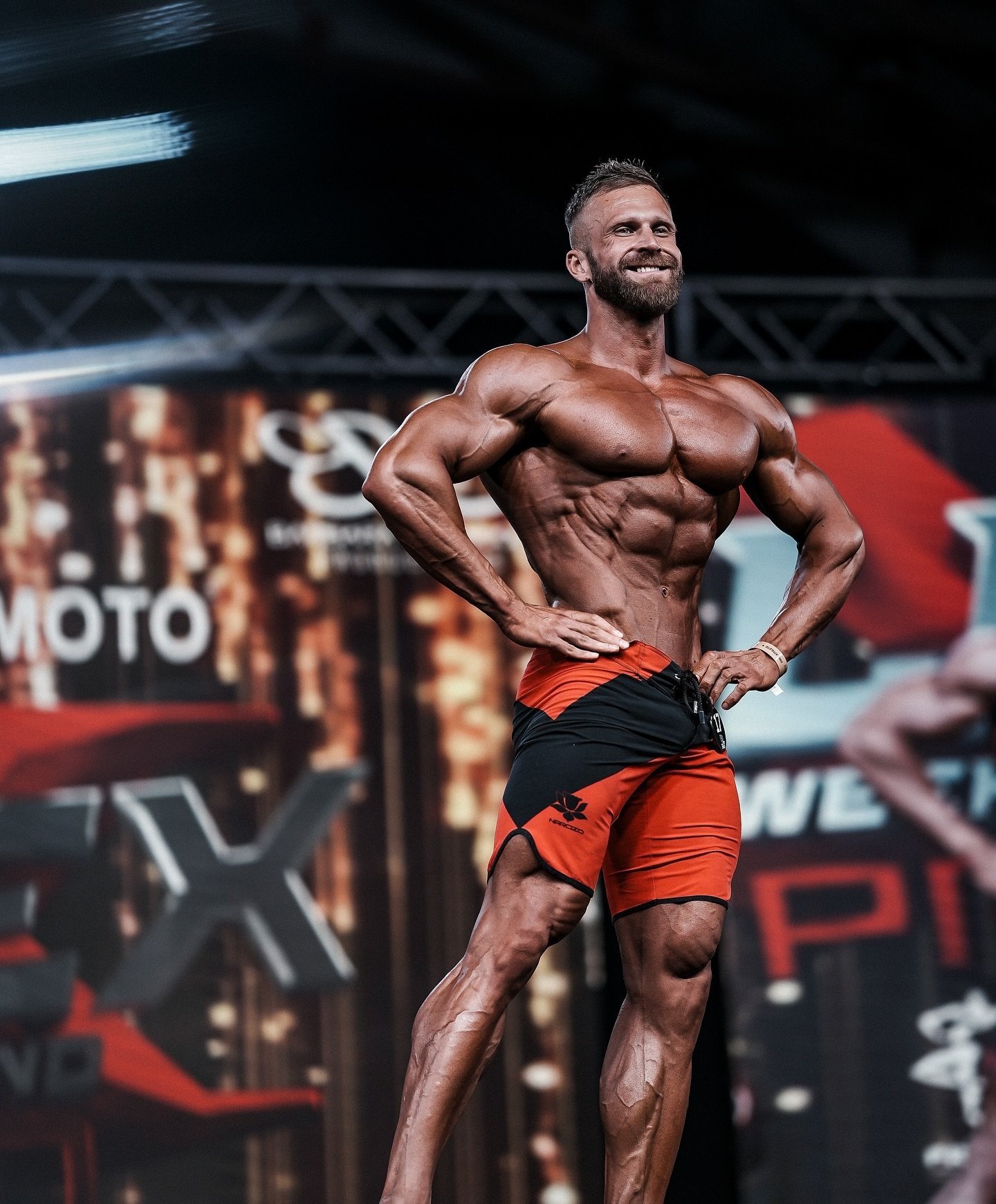 Miroslav Juríček posing on stage at the FLEX Weekend Italy Pro 2025
