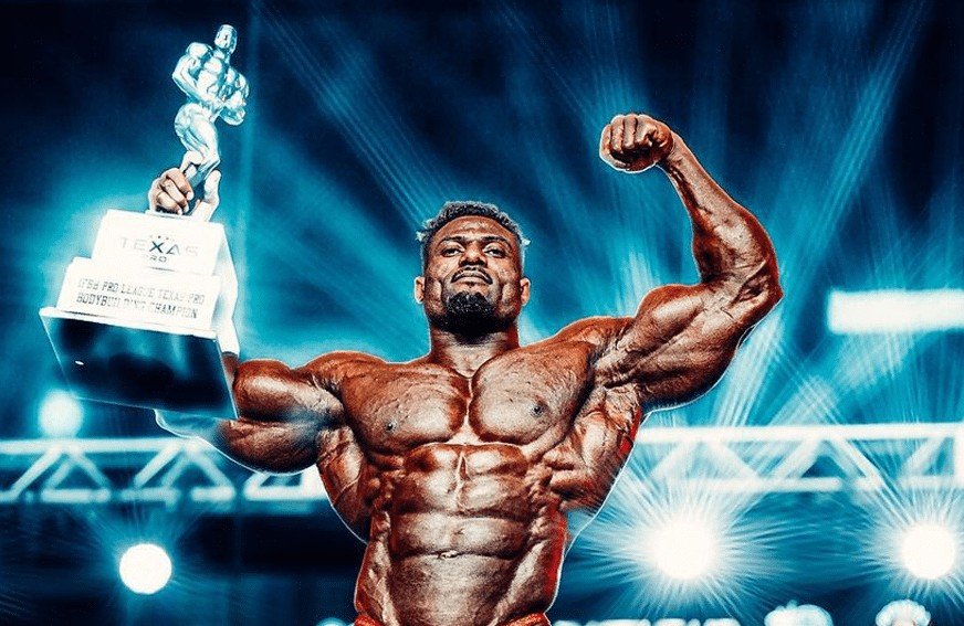 Andrew Jacked holding the Texas Pro trophy in 2023
