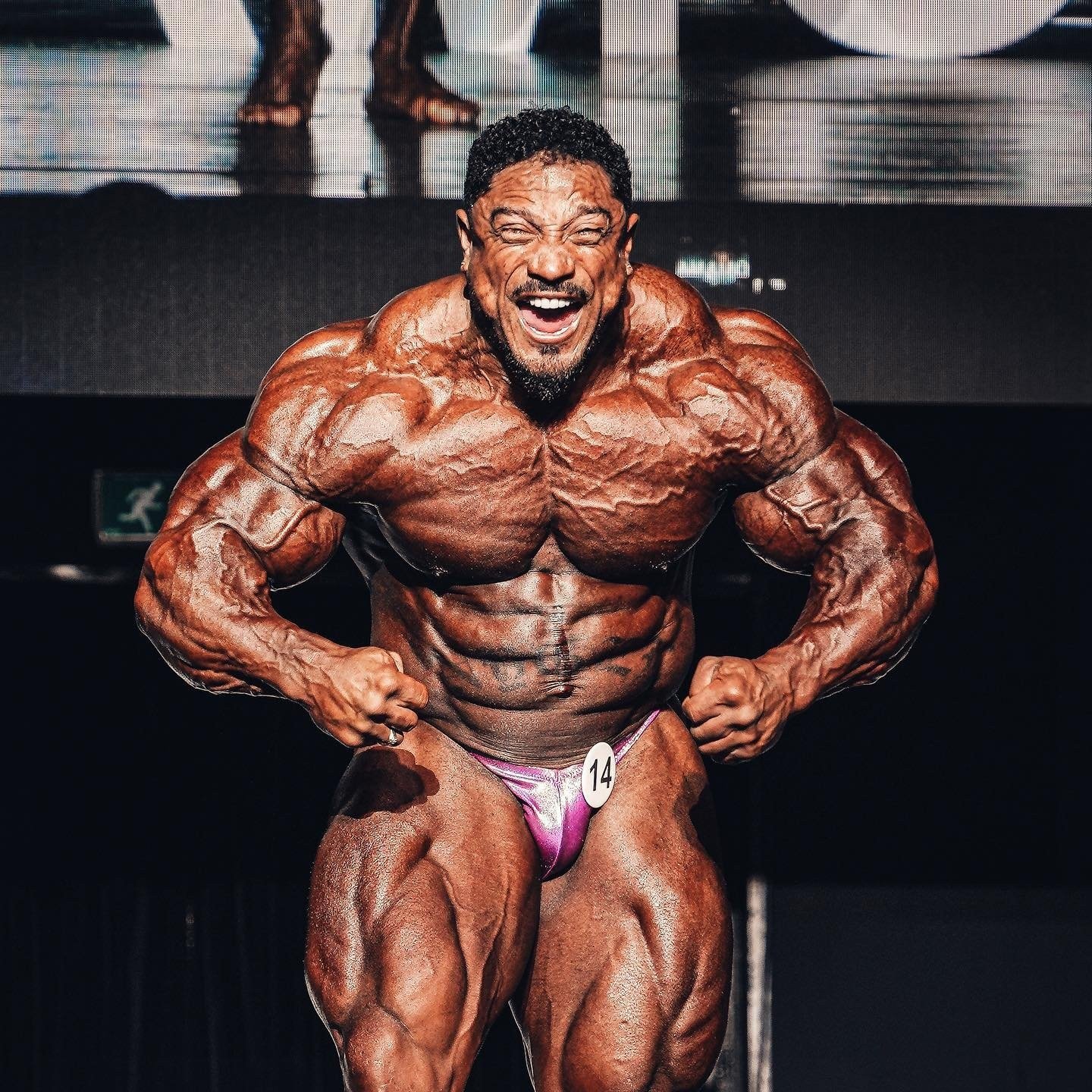 Roelly Winklaar hitting a front lat spread on stage