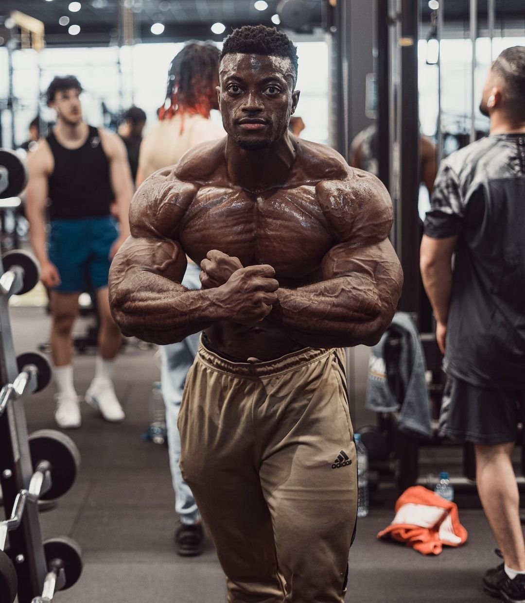 Stephane Matala showing his upper-body muscle detail in the gym