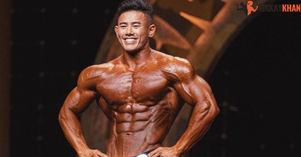 Steven Cao on stage in Men's Physique