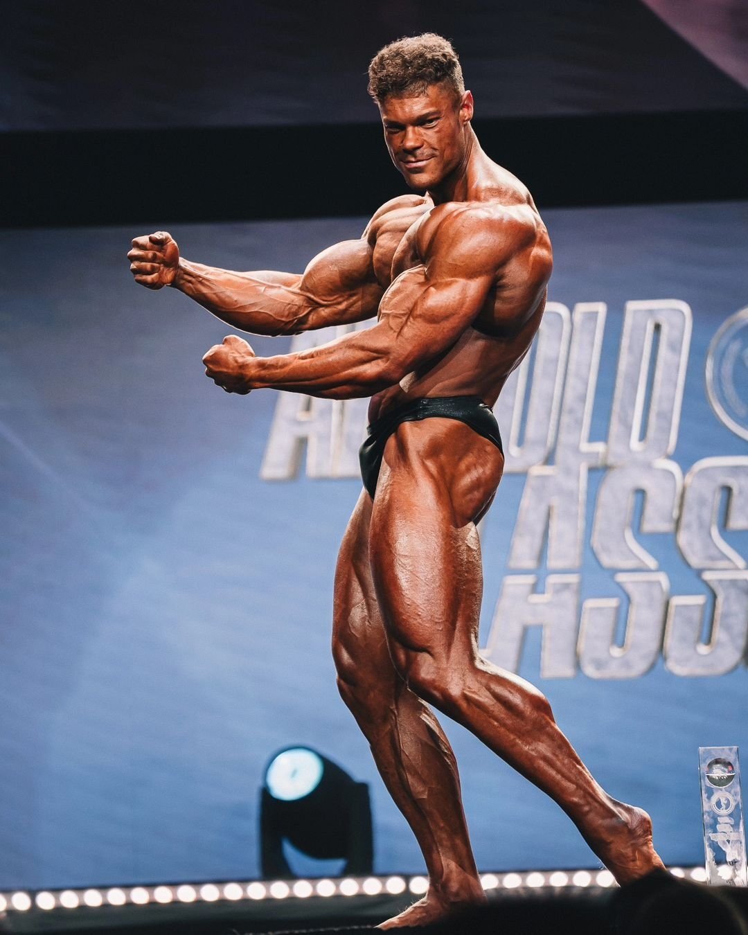 Wesley Vissers posing on the Arnold Classic stage