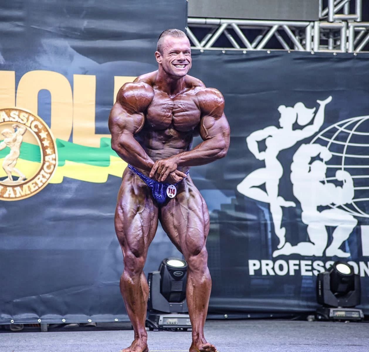 William Martins posing on stage at the Arnold Classic South America