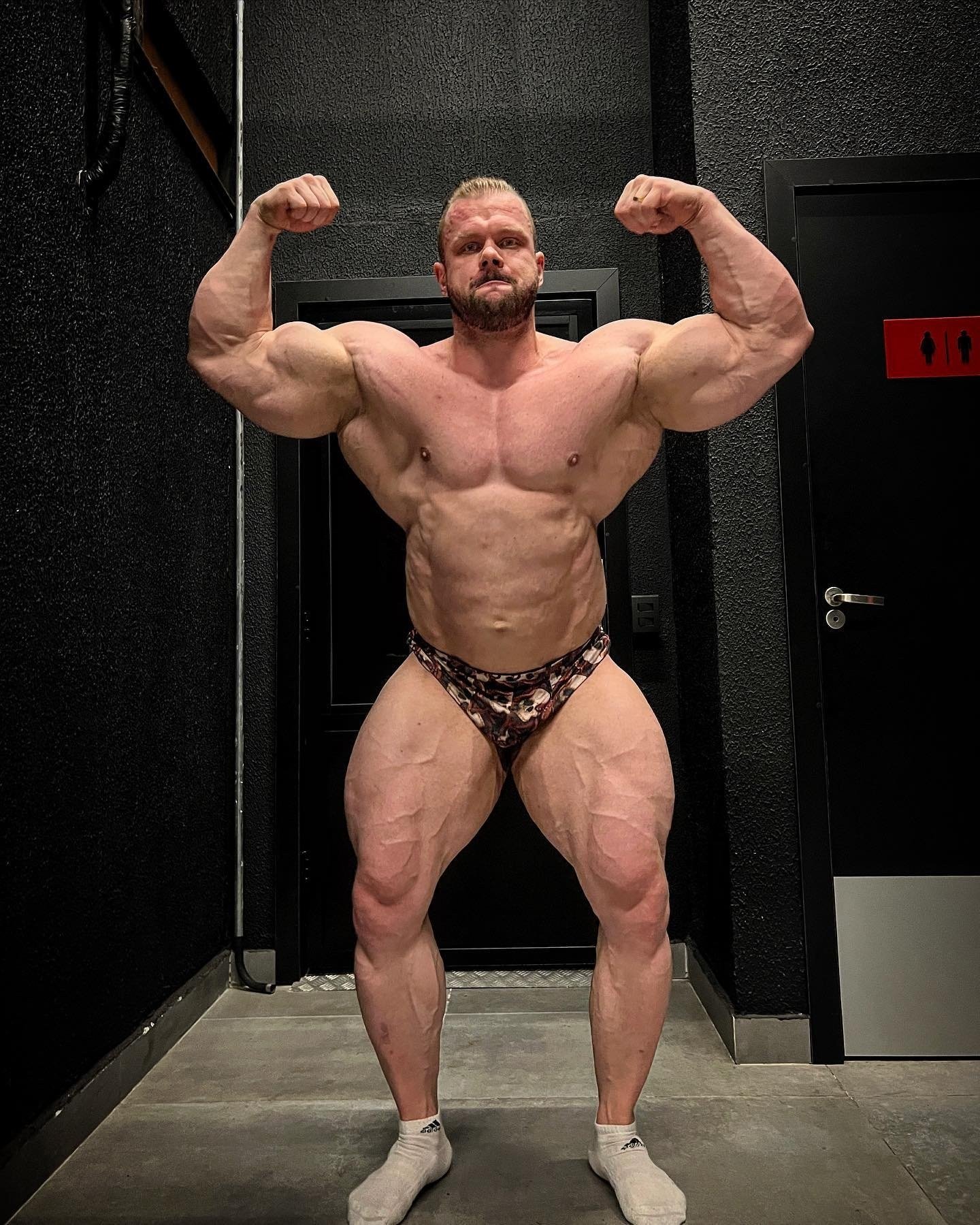 William Martins posing backstage during contest prep